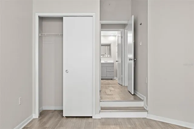 a view of a bathroom from a hallway