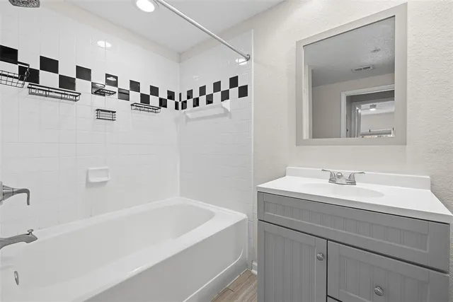 a swimming pool with outdoor seating and yard