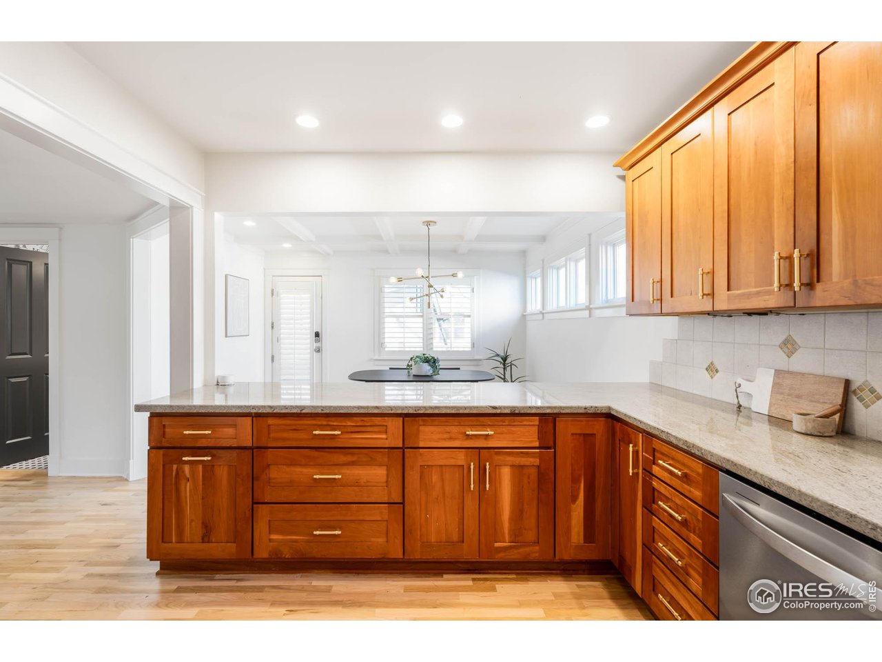 2543 Pine Street Boulder, CO 80302 - Photo 12 of 40 a kitchen with a sink a cabinets and window