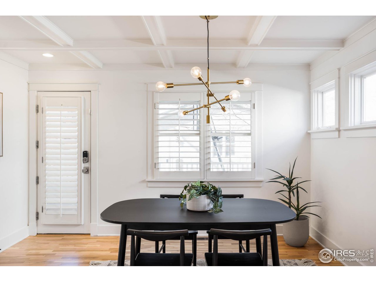 2543 Pine Street Boulder, CO 80302 - Photo 13 of 40 a view of a dining room with furniture and wooden floor