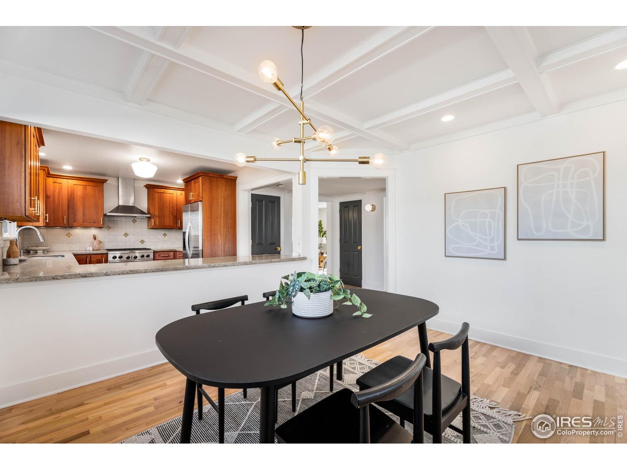 2543 Pine Street Boulder, CO 80302 - Photo 14 of 40 a view of a dining room with furniture and wooden floor