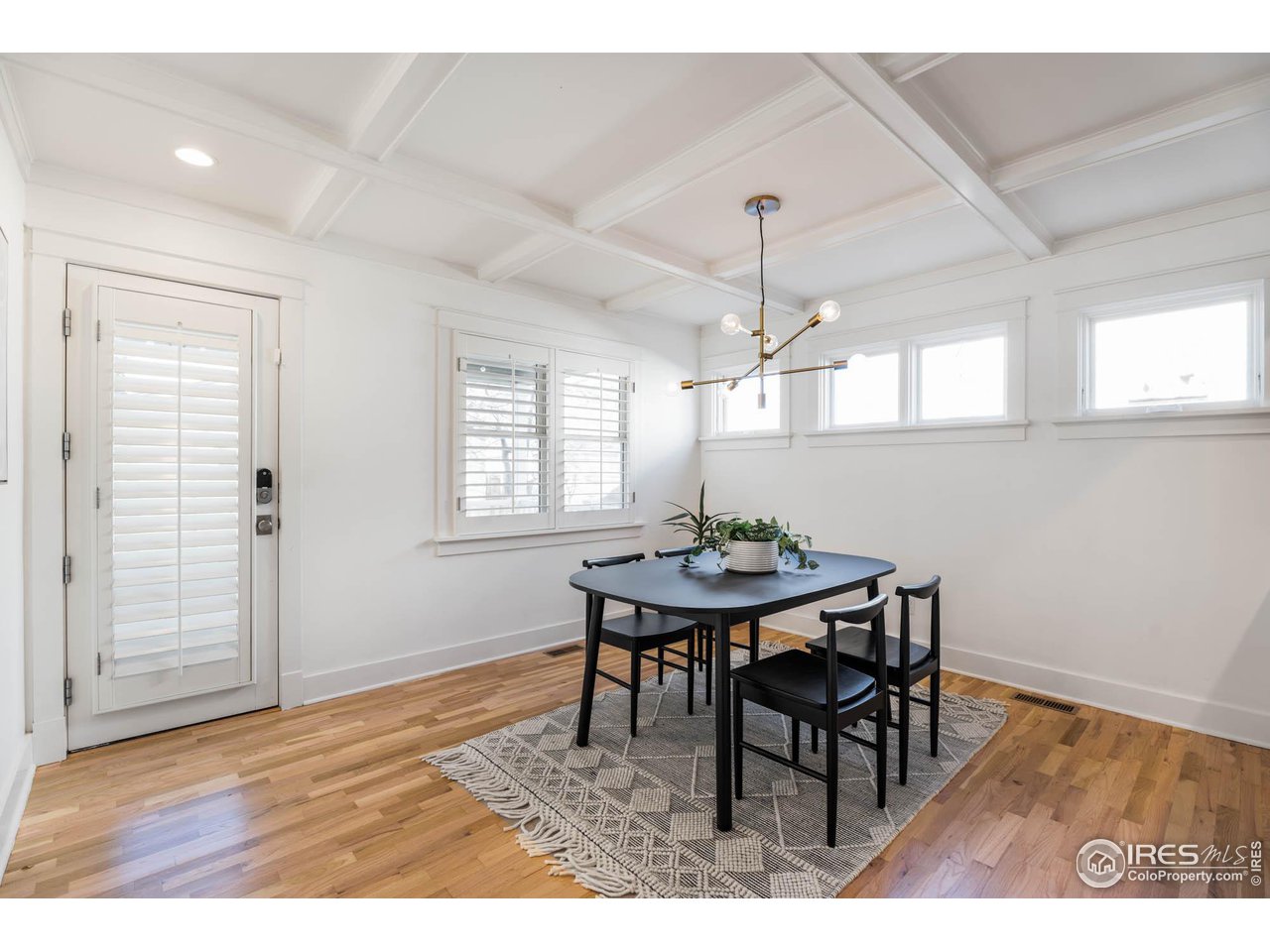 2543 Pine Street Boulder, CO 80302 - Photo 15 of 40 a view of a dining room with furniture and window
