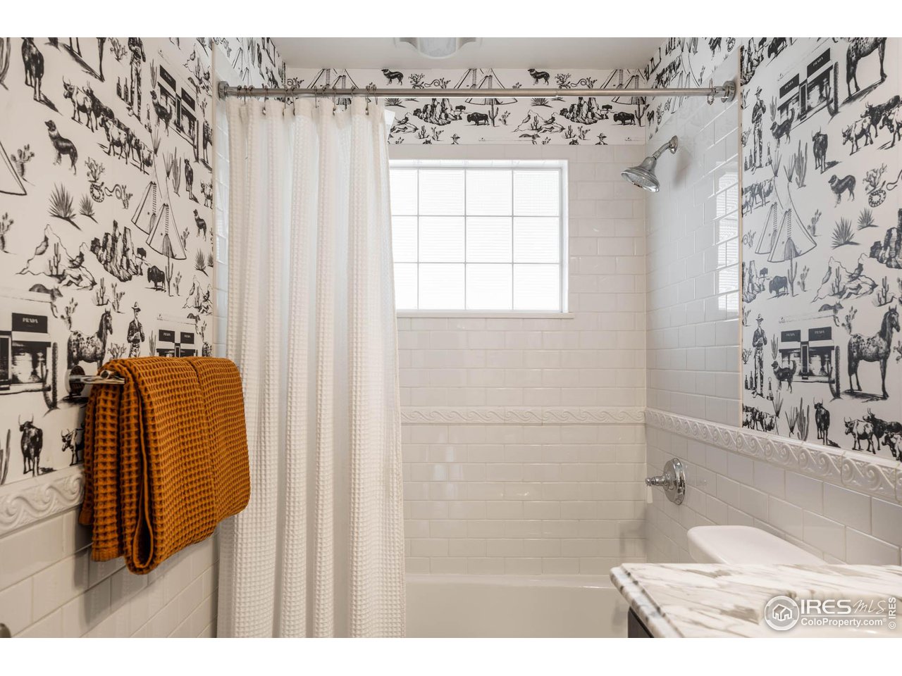 2543 Pine Street Boulder, CO 80302 - Photo 17 of 40 a bathroom with a sink and a mirror