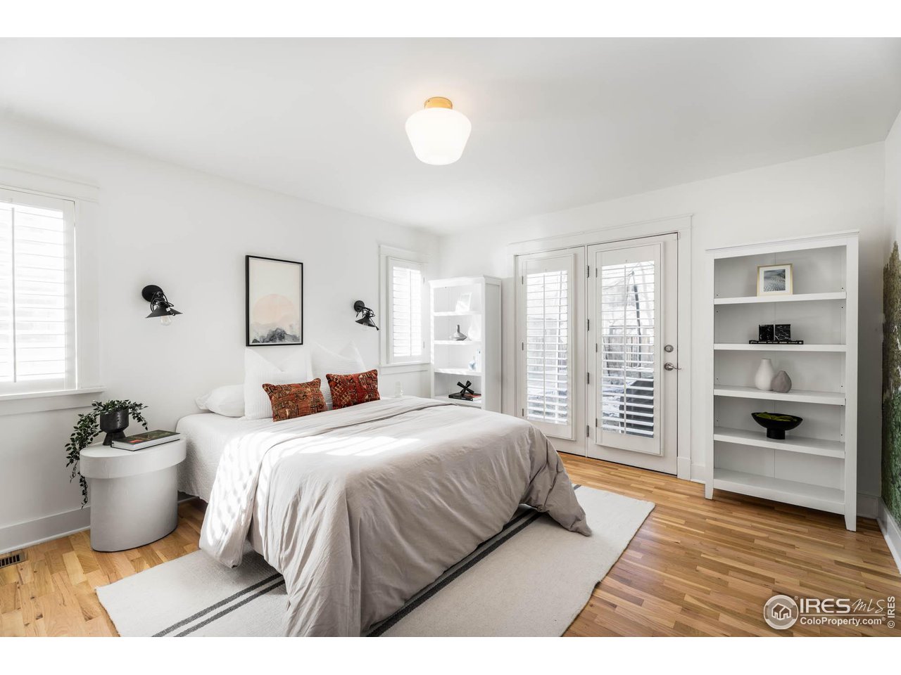 2543 Pine Street Boulder, CO 80302 - Photo 18 of 40 a bedroom with a bed and a view of kitchen