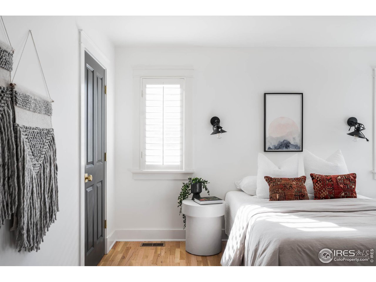 2543 Pine Street Boulder, CO 80302 - Photo 19 of 40 a bed room with a bed and a painting