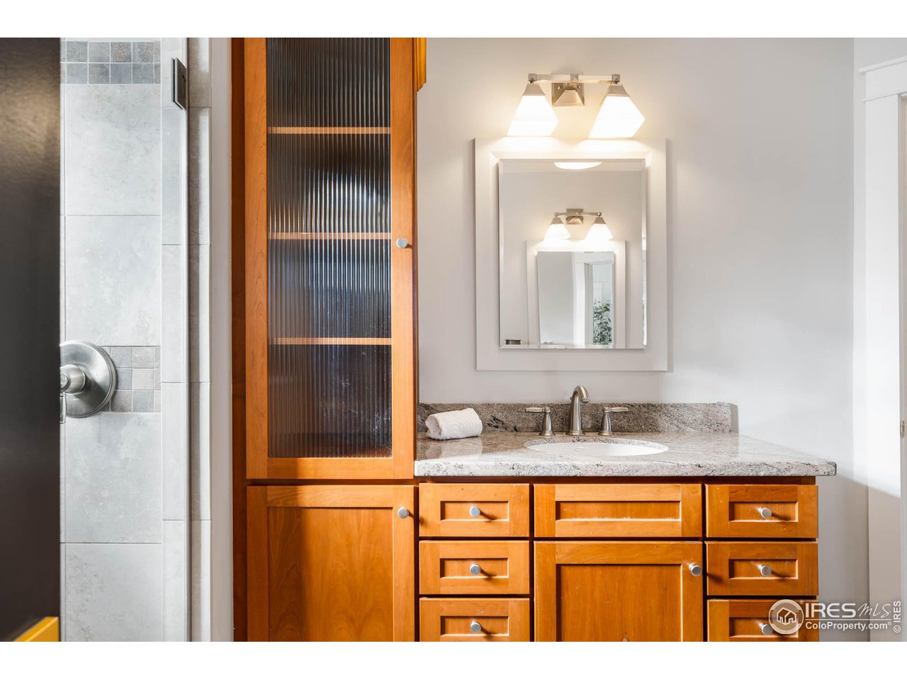 2543 Pine Street Boulder, CO 80302 - Photo 24 of 40 a bathroom with a sink and a mirror