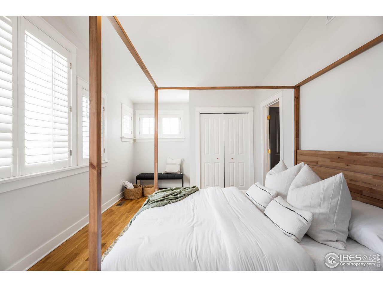 2543 Pine Street Boulder, CO 80302 - Photo 25 of 40 a bedroom with a bed and a large window