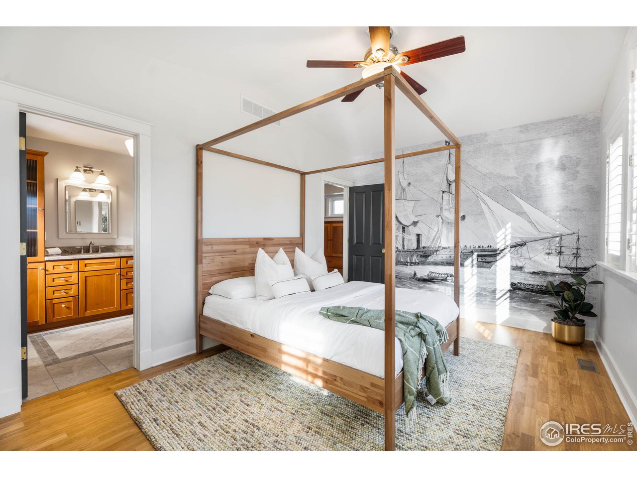 2543 Pine Street Boulder, CO 80302 - Photo 26 of 40 a living room with a bed furniture and a kitchen view