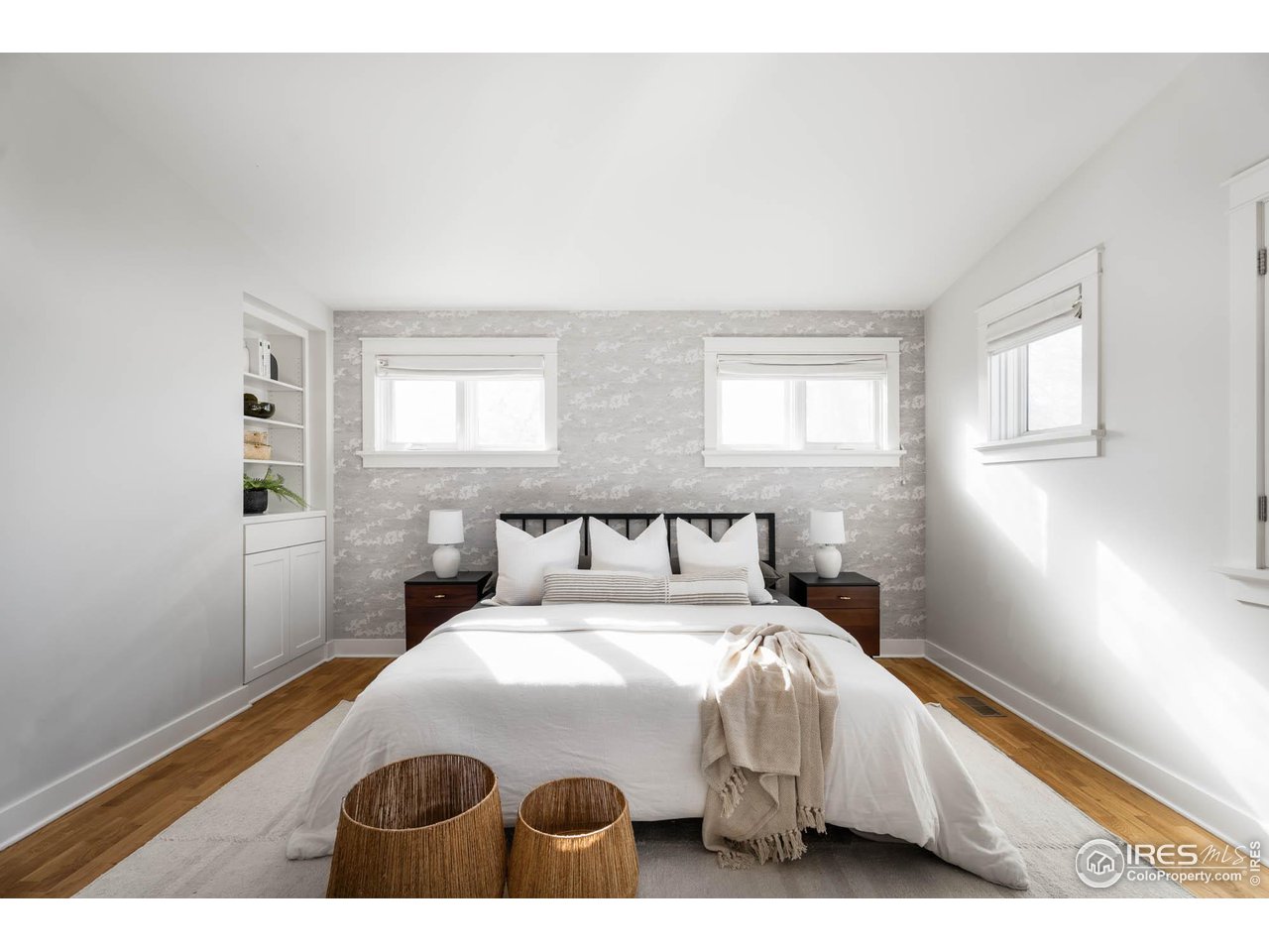 2543 Pine Street Boulder, CO 80302 - Photo 28 of 40 a bed sitting in a bedroom next to a window