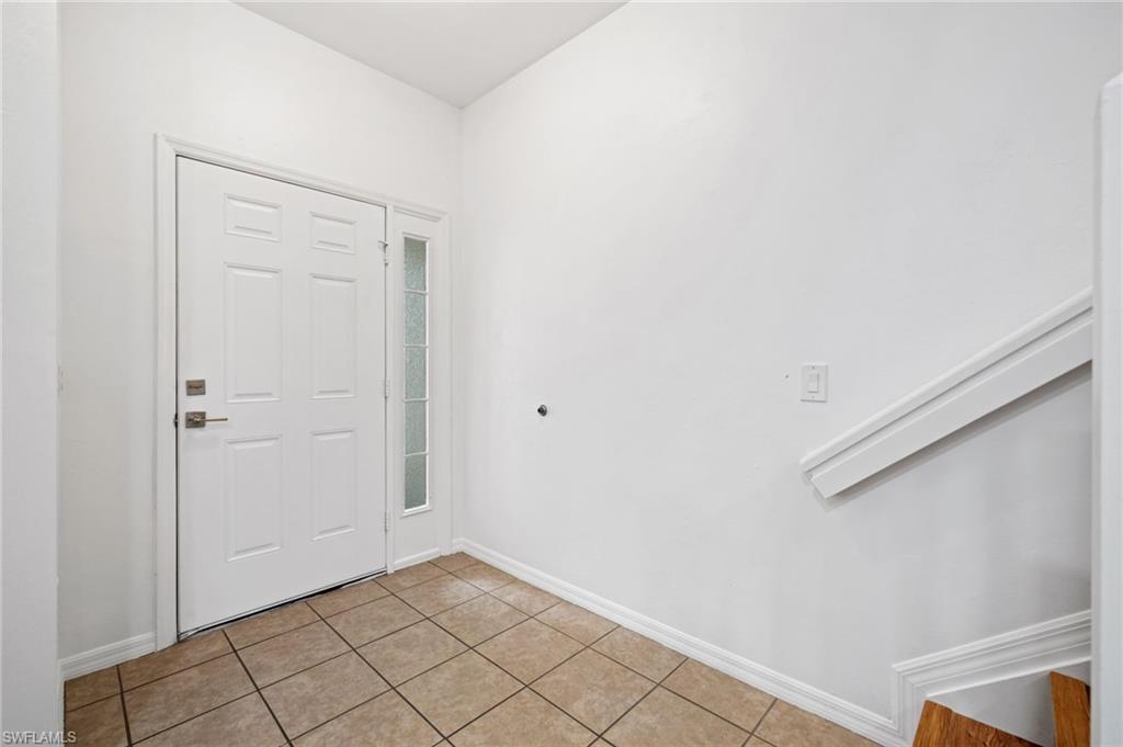 880 Hampton Circle, Unit 160 Naples, FL 34105 - Photo 14 of 32 a view of an empty walk in closet