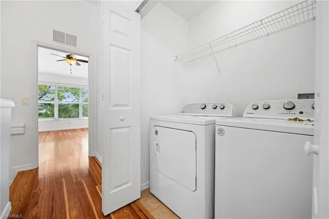a utility room with dryer and washer