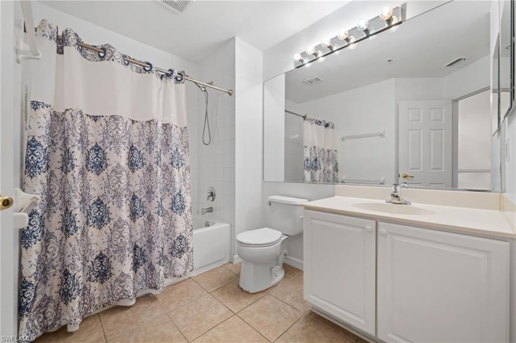 880 Hampton Circle, Unit 160 Naples, FL 34105 - Photo 23 of 32 a bathroom with a sink toilet and shower