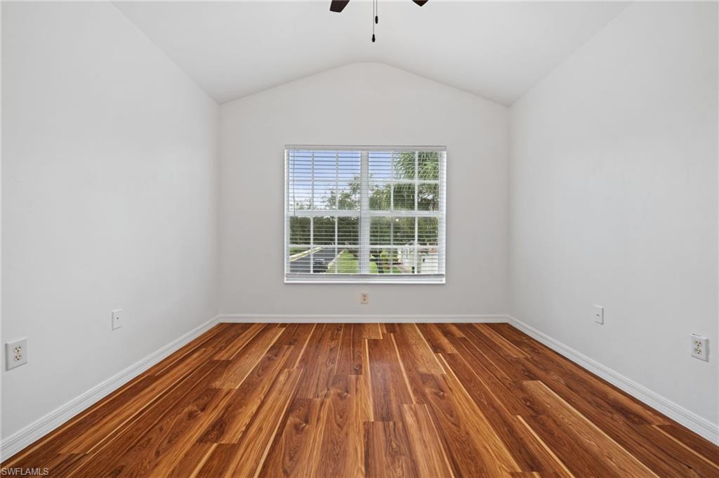 880 Hampton Circle, Unit 160 Naples, FL 34105 - Photo 26 of 32 a view of wooden floor in a room