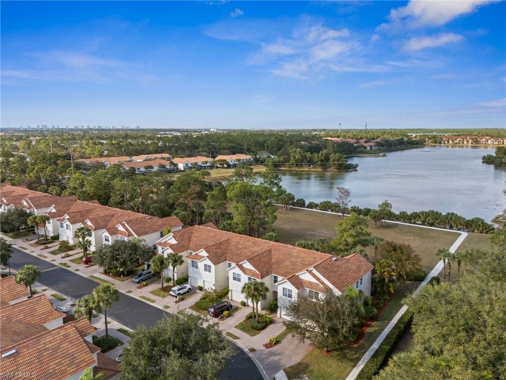 880 Hampton Circle, Unit 160 Naples, FL 34105 - Photo 29 of 32 a view of a lake with big yard
