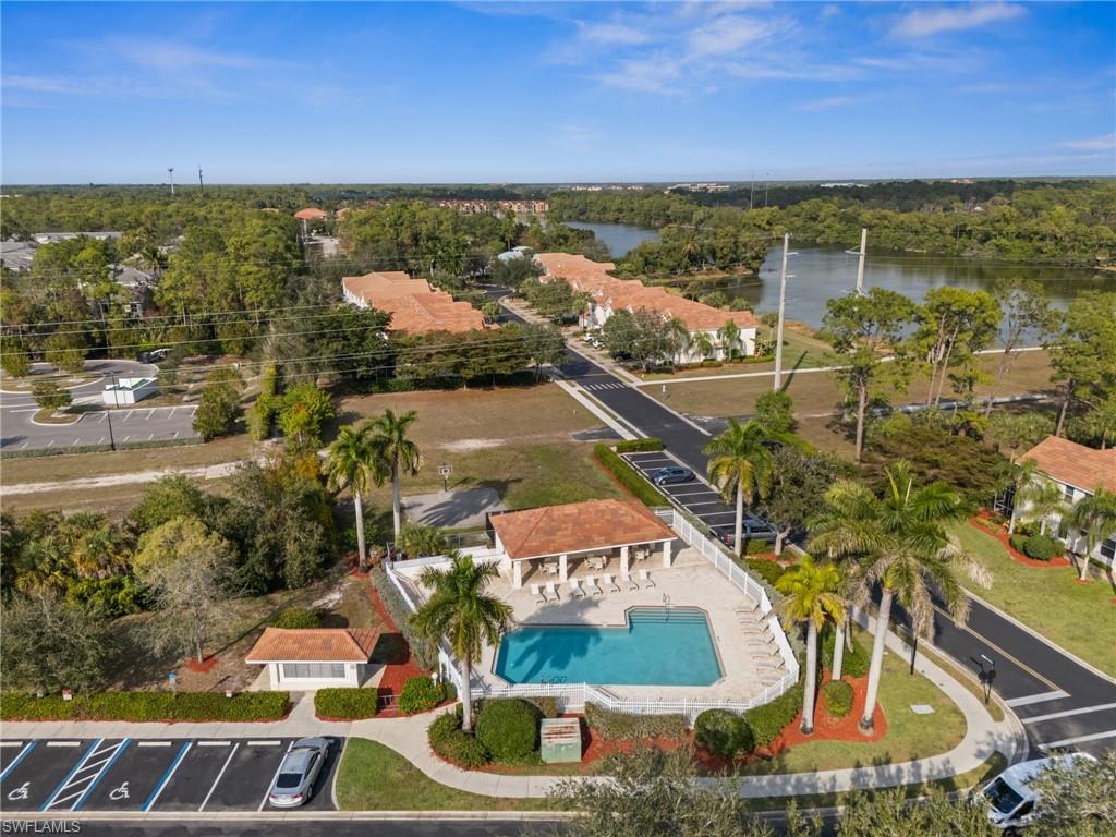 880 Hampton Circle, Unit 160 Naples, FL 34105 - Photo 32 of 32 an aerial view of residential houses with outdoor space
