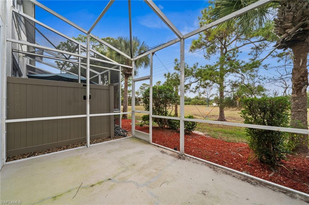 880 Hampton Circle, Unit 160 Naples, FL 34105 - Photo 7 of 32 a view of outdoor space with wooden floor and yard in the back