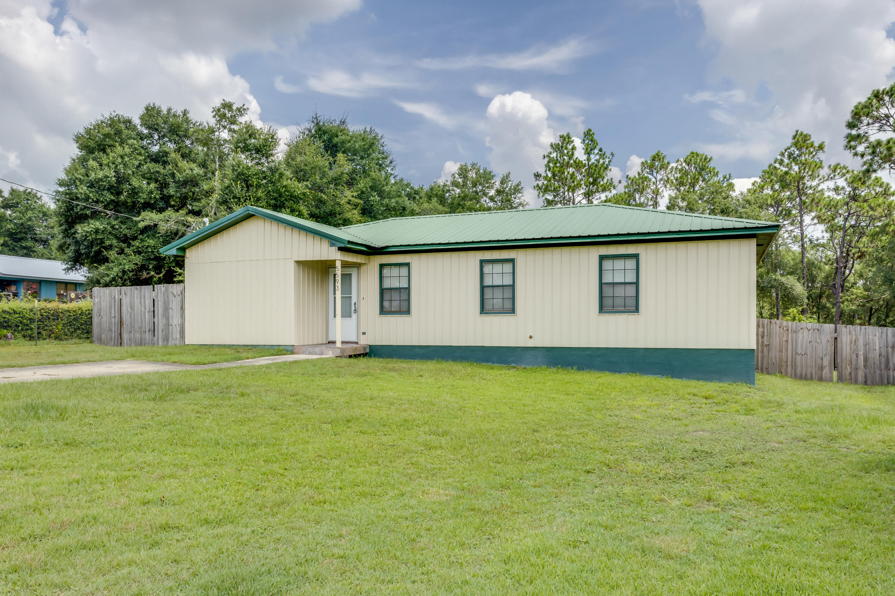 5593 Galaxy Drive Crestview, FL 32539 - Photo 18 of 19 a house view with a garden space