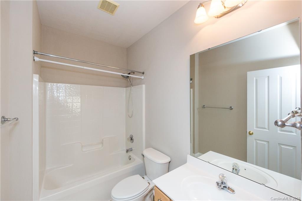 17530 Invermere Avenue Huntersville, NC 28078 - Photo 29 of 36 a bathroom with a sink a toilet and shower