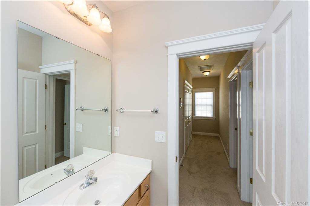 17530 Invermere Avenue Huntersville, NC 28078 - Photo 30 of 36 a en suite bathroom with a sink shower and a mirror