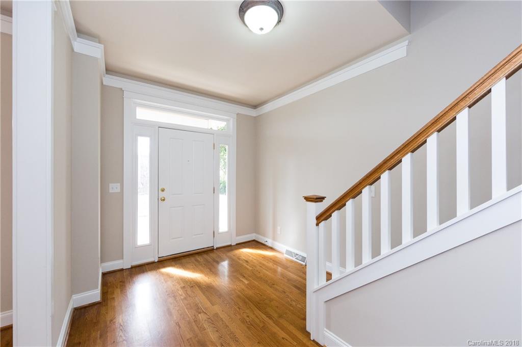 17530 Invermere Avenue Huntersville, NC 28078 - Photo 4 of 36 a view of an entryway with wooden floor