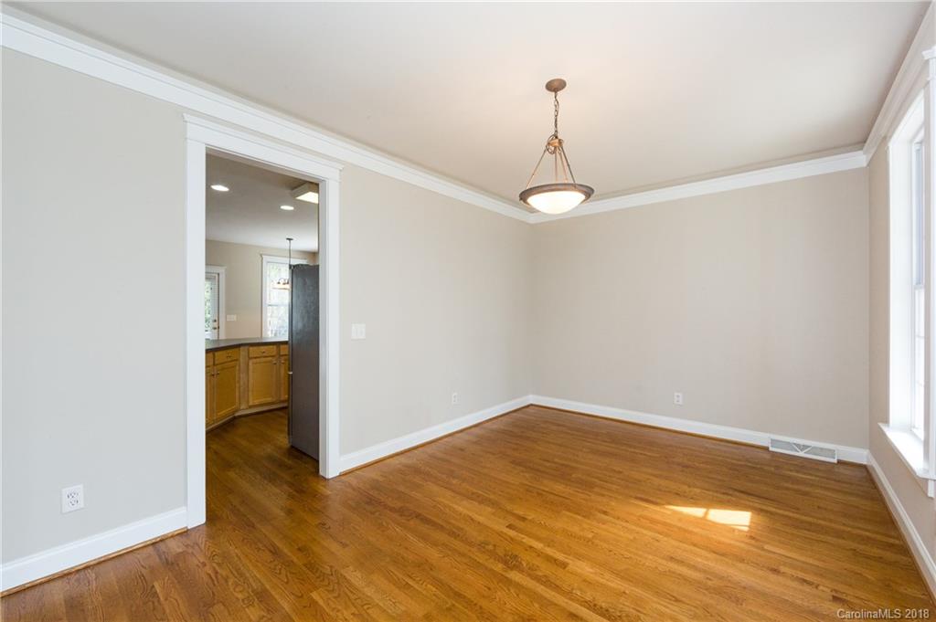 17530 Invermere Avenue Huntersville, NC 28078 - Photo 7 of 36 a view of a livingroom with wooden floor