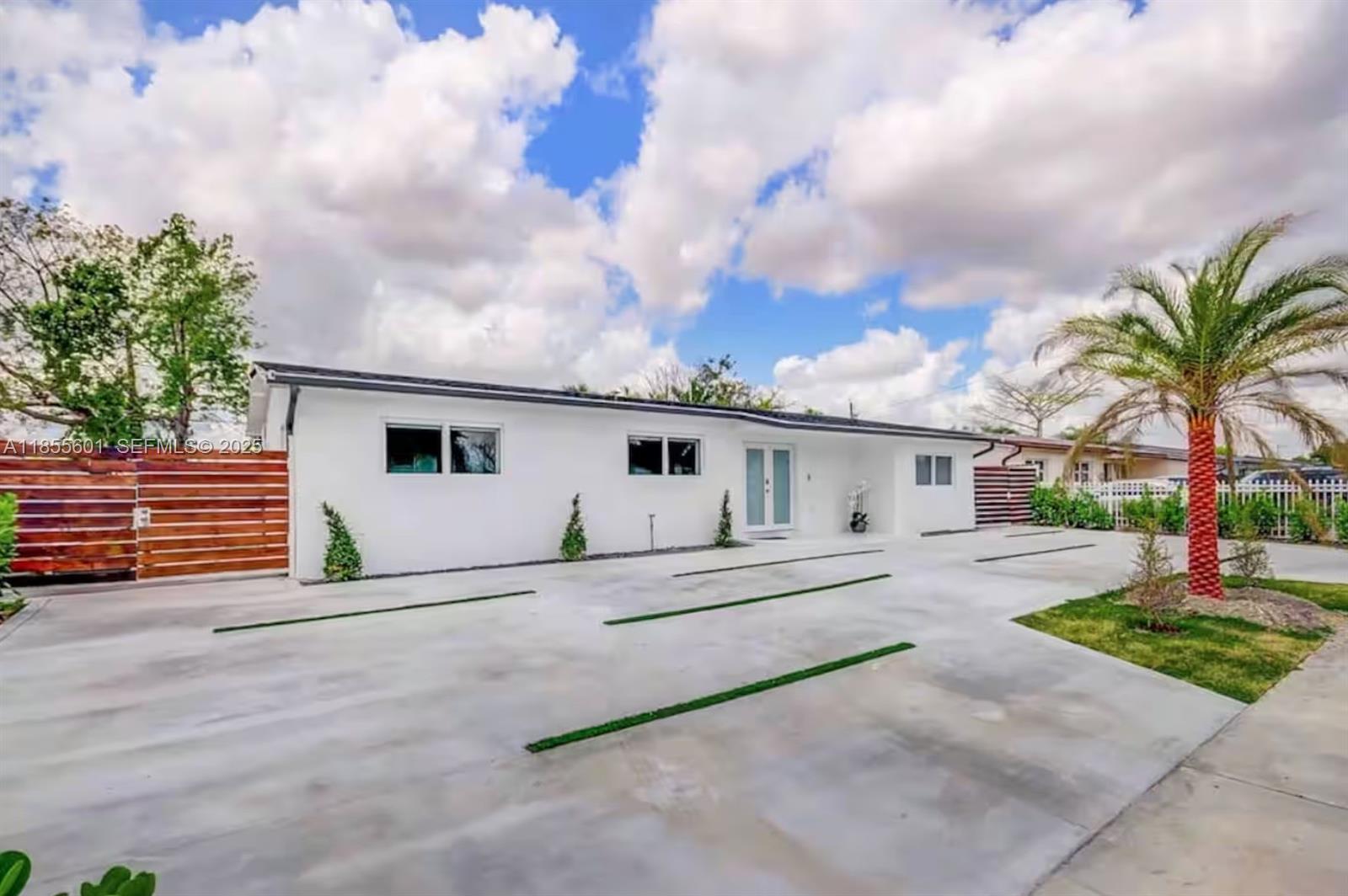 a house with trees in front of it