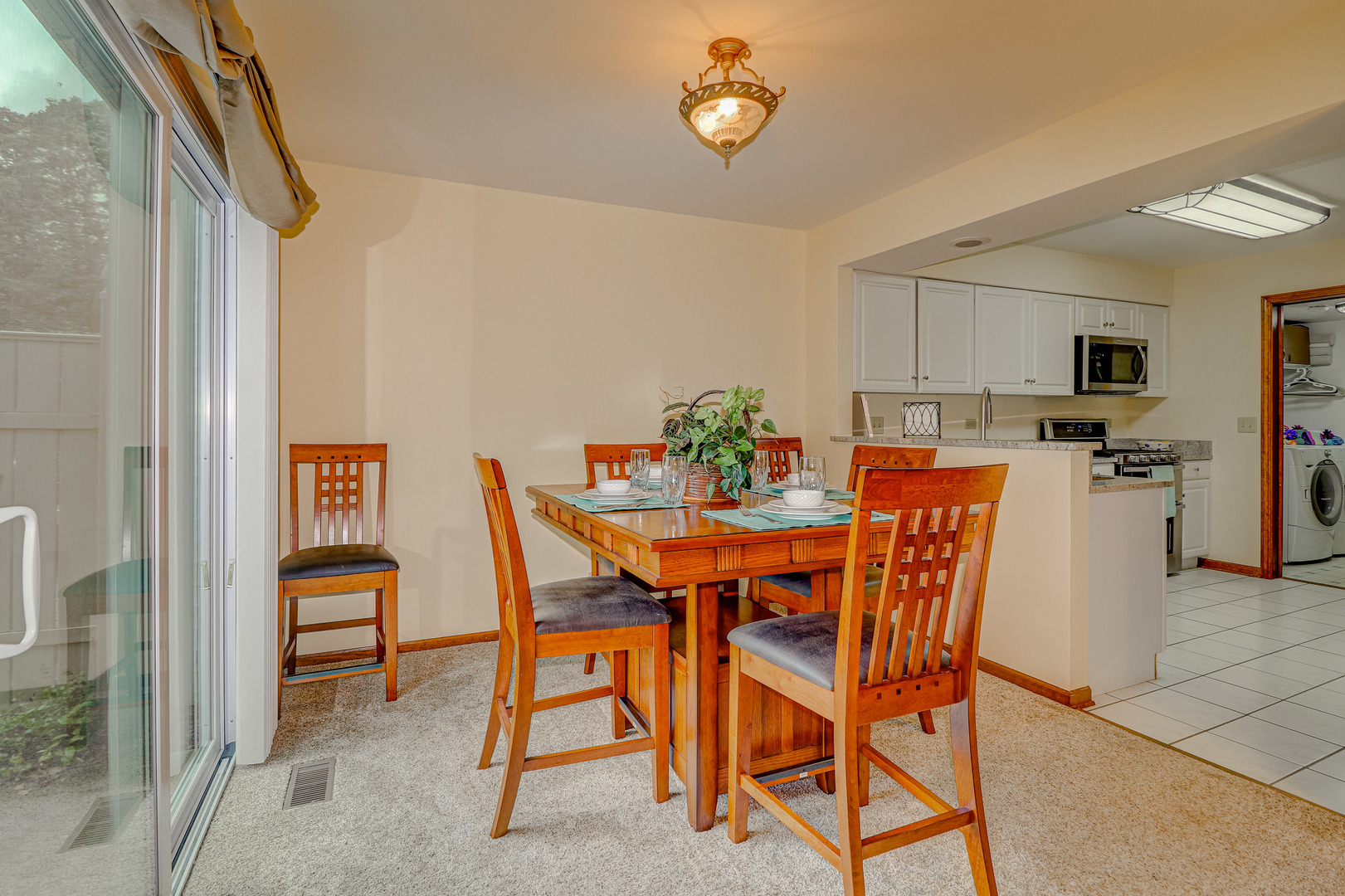 1230 Coldspring Road Elgin, IL 60120 - Photo 5 of 30 a dining room with furniture and window