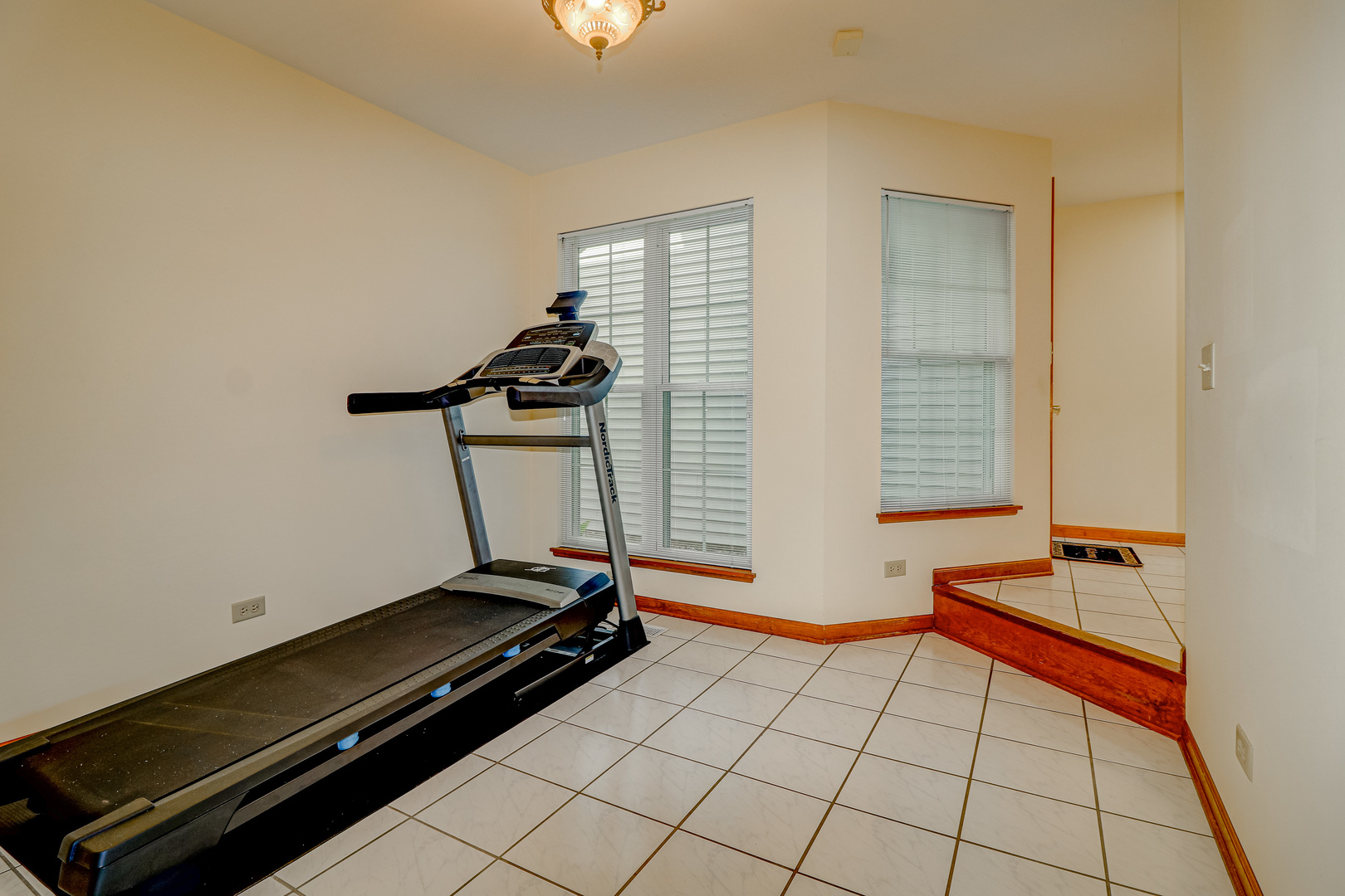 1230 Coldspring Road Elgin, IL 60120 - Photo 8 of 30 a view of an empty room with windows