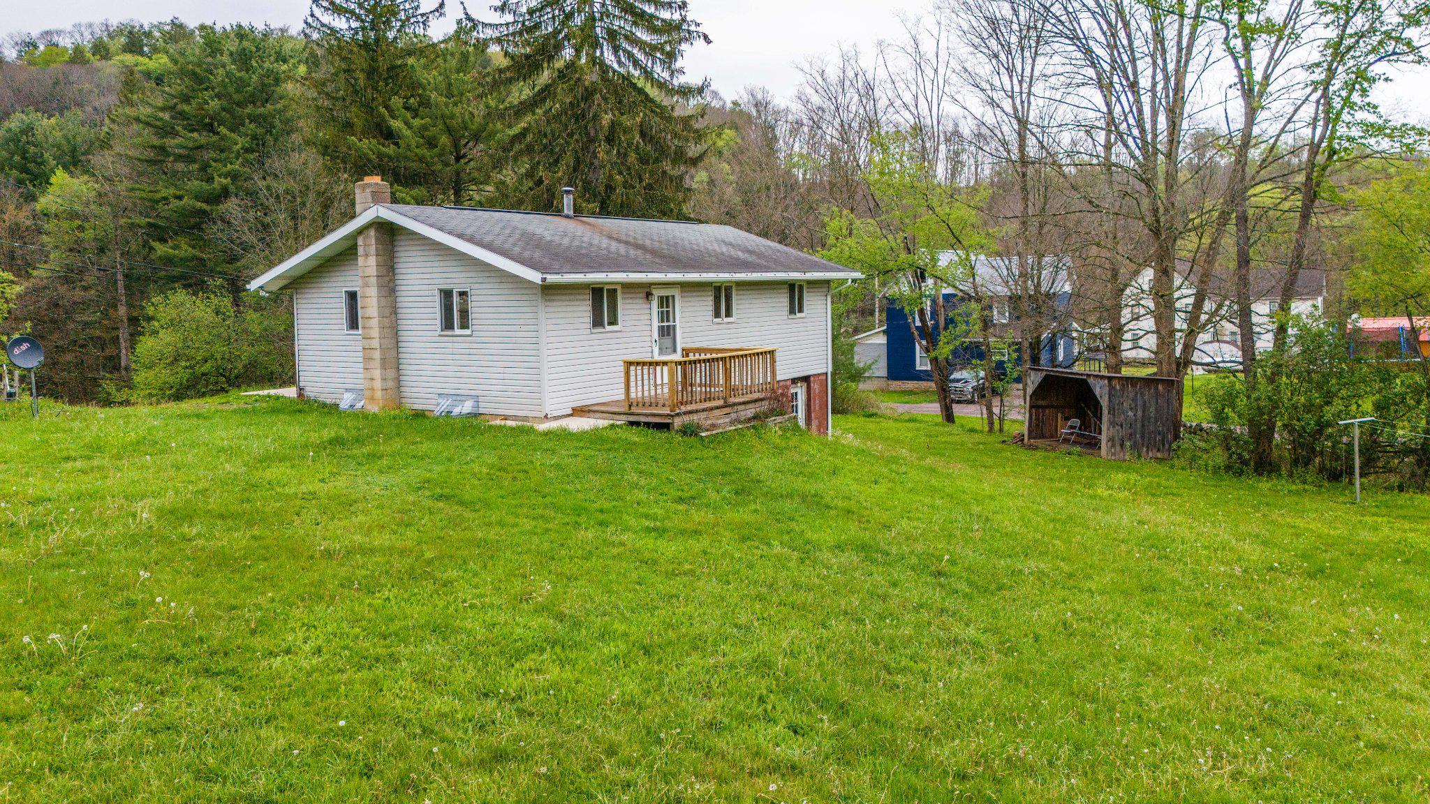2155 Jennings Road Grantsville, MD 21536 - Photo 5 of 39 Charming hillside retreat with greenery rear view