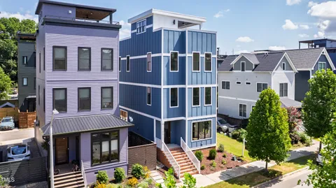 an aerial view of a house with a garden view