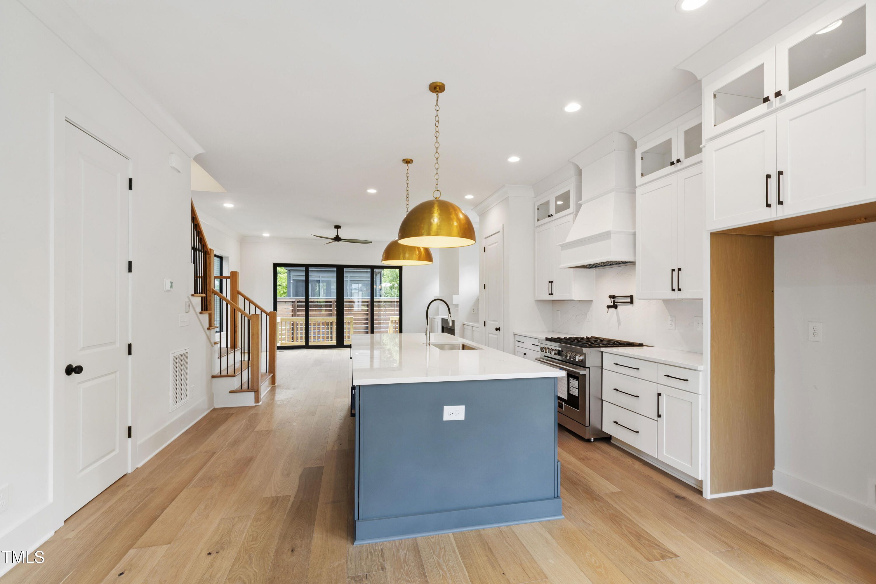 618 Velma Hopkins Lane Raleigh, NC 27603 - Photo 28 of 63 a large kitchen with stainless steel appliances granite countertop a stove and refrigerator