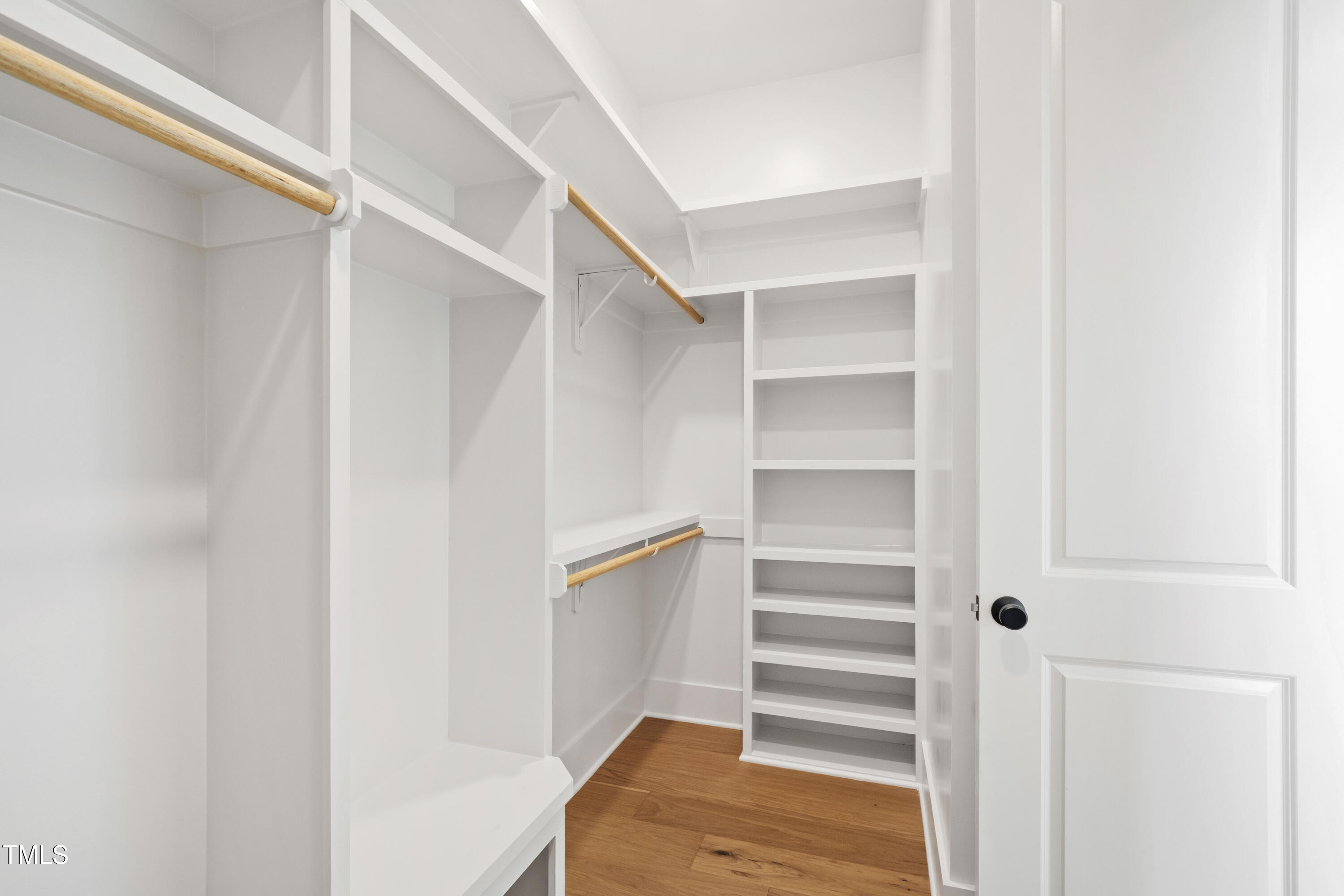 618 Velma Hopkins Lane Raleigh, NC 27603 - Photo 56 of 63 a view of walk in closet with empty racks