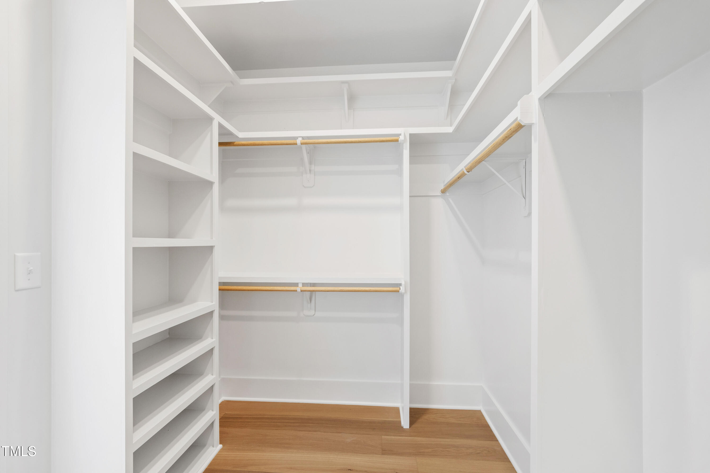 618 Velma Hopkins Lane Raleigh, NC 27603 - Photo 57 of 63 a view of an empty walk in closet