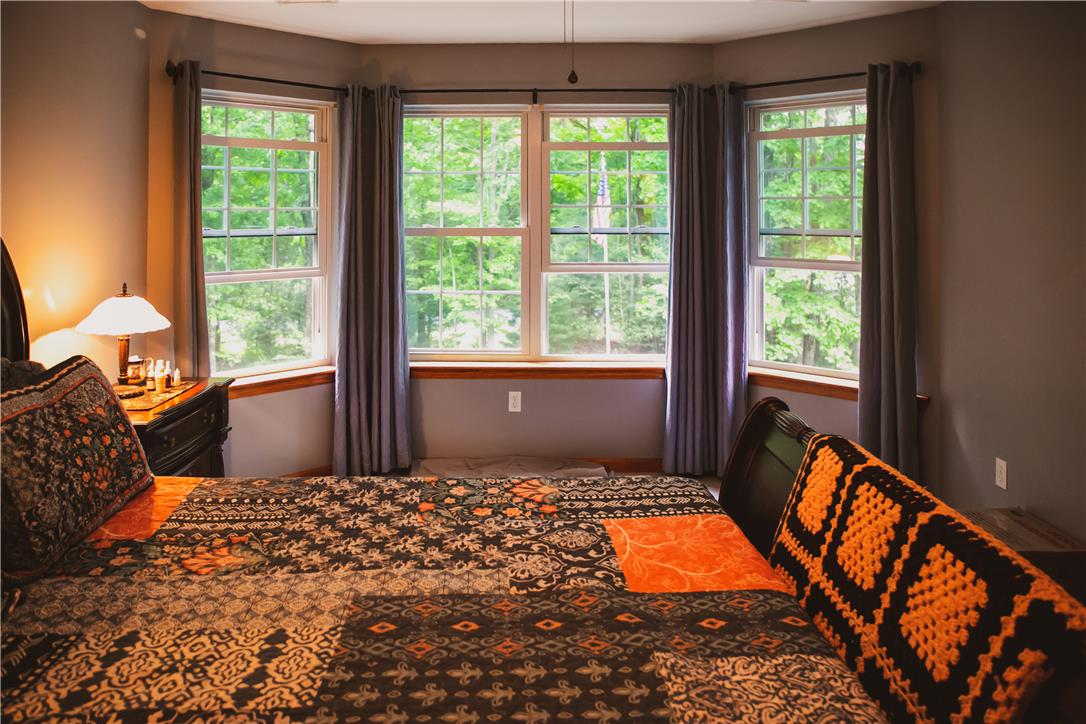 50 Anthony's Road White Haven, PA 18661 - Photo 35 of 57 a bedroom with a bed and wooden floor