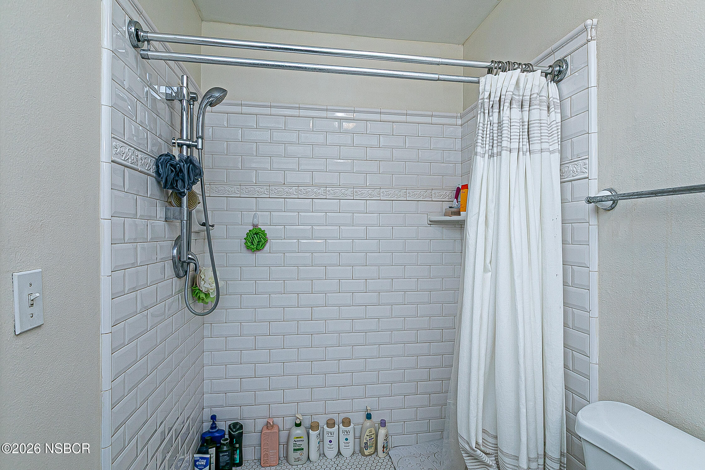 712 Pebble Beach Place Santa Maria, CA 93454 - Photo 20 of 31 a bathroom with a shower and a sink