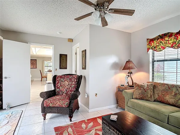 a living room with furniture and a window