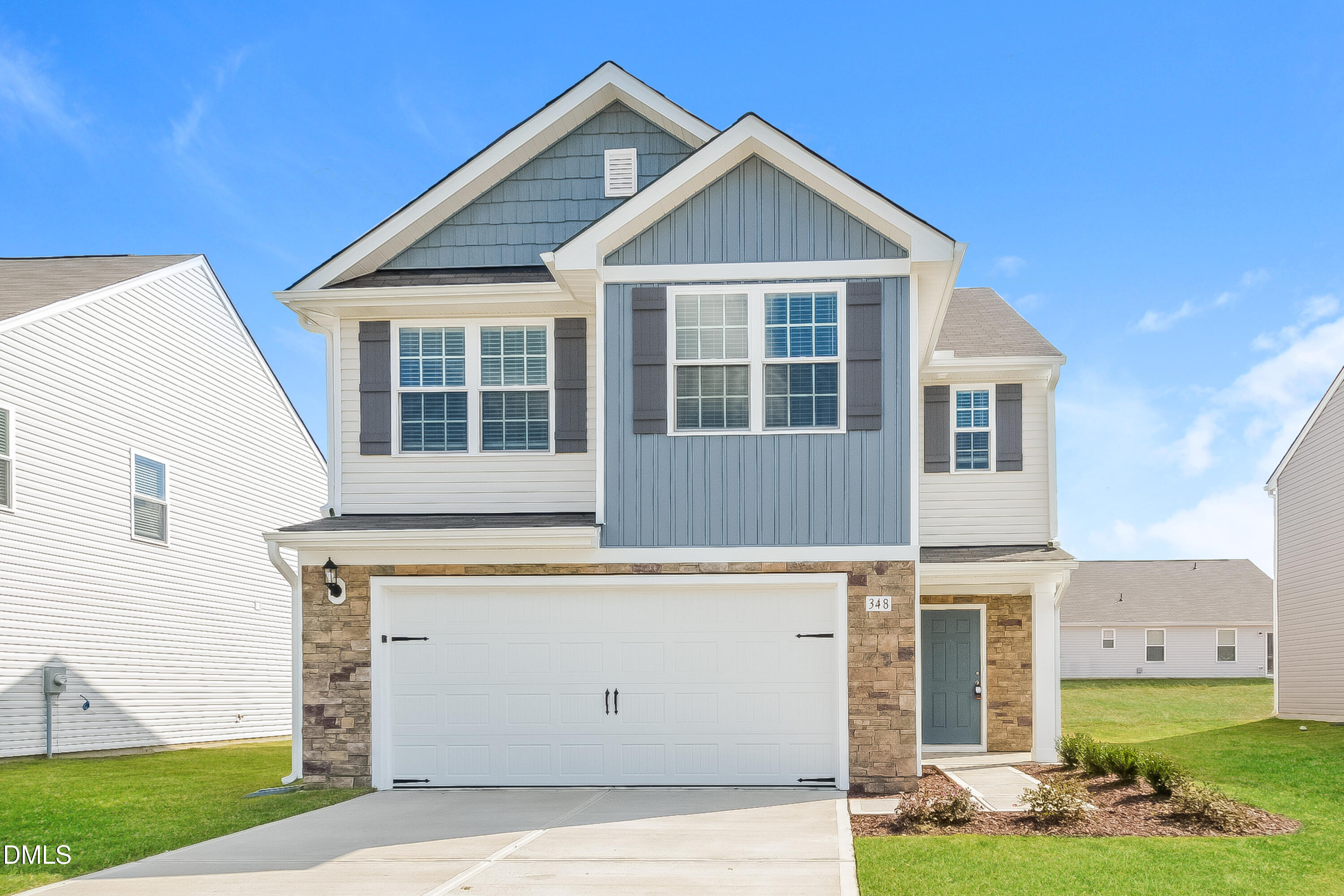 348 Gourd Street Zebulon, NC 27597 - Photo 2 of 17 a front view of a house with a yard