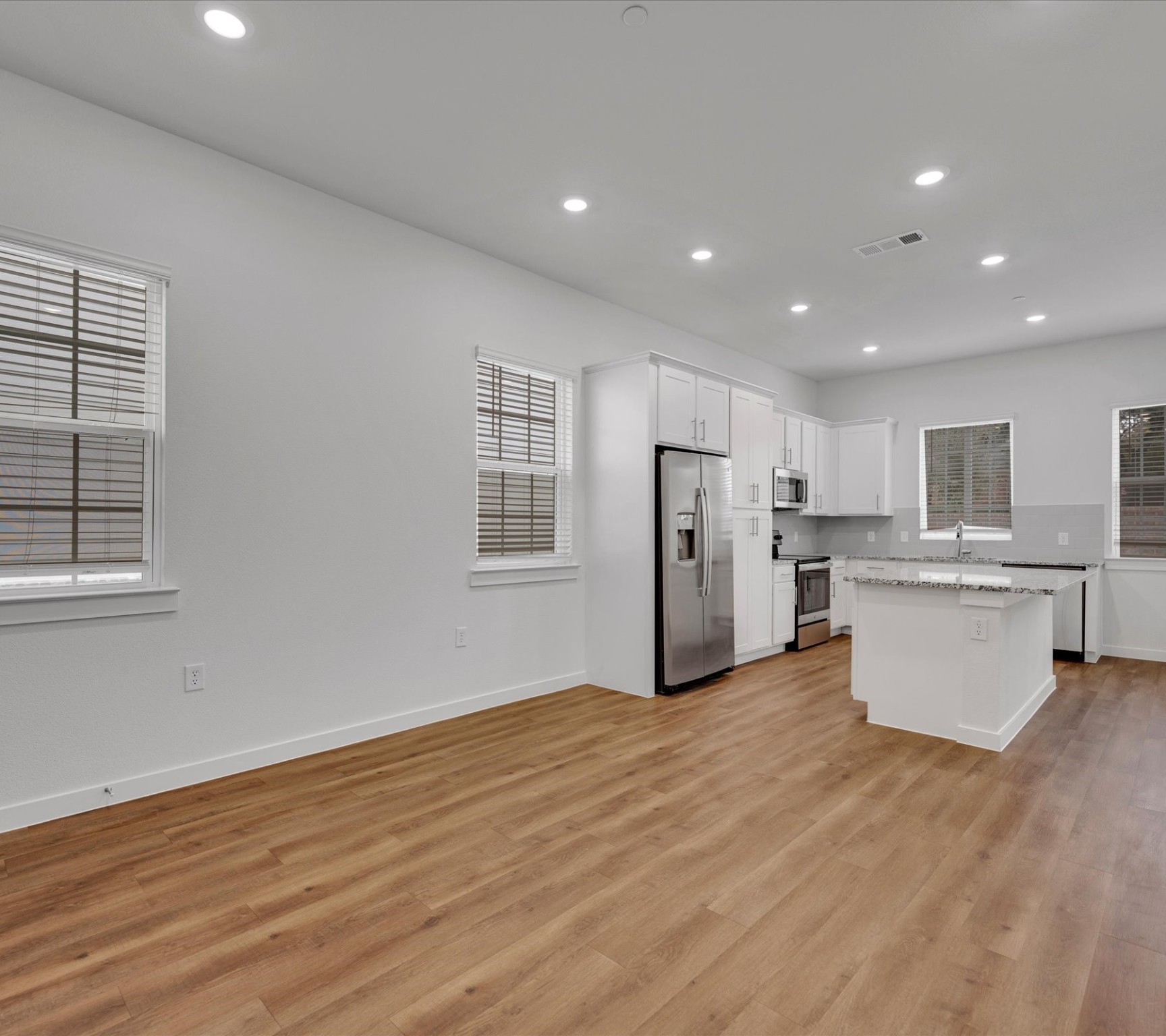 2709-101 Rockhill Road McKinney, TX 75072 - Photo 7 of 21 a view of kitchen with wooden floor