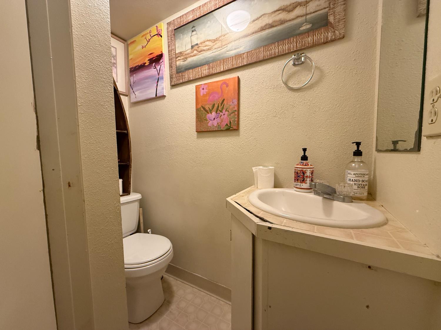 4621 Swanson Road Denair, CA 95316 - Photo 14 of 58 a bathroom with a sink and a toilet