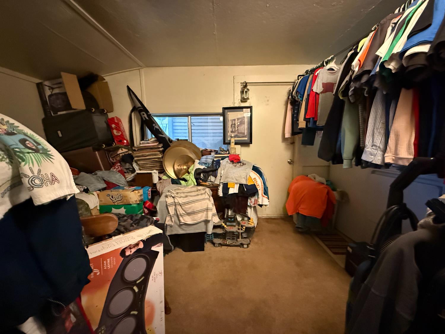4621 Swanson Road Denair, CA 95316 - Photo 28 of 58 a view of walk in closet with clothes and shoes