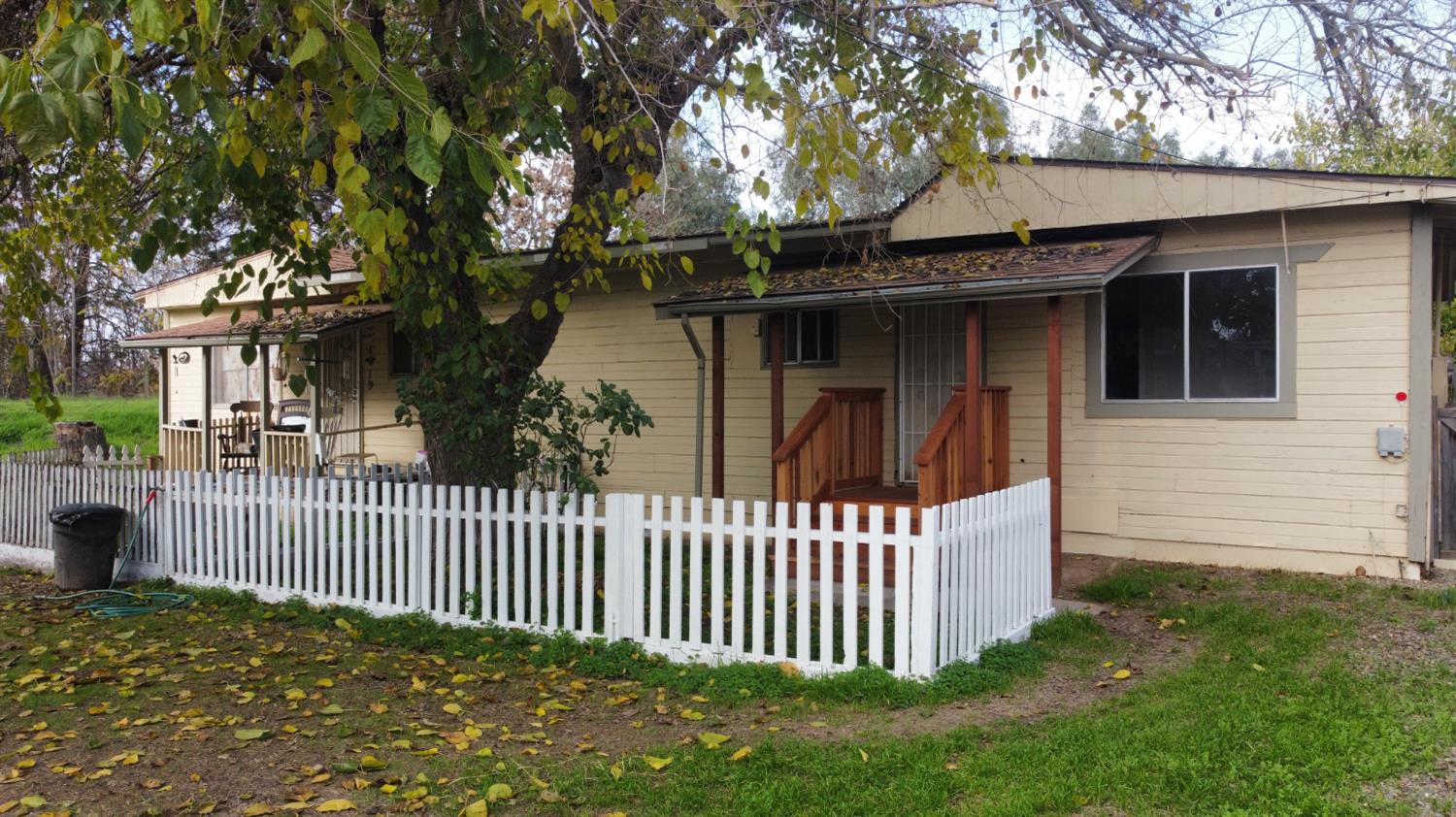 4621 Swanson Road Denair, CA 95316 - Photo 46 of 58 a front view of a house with a fence
