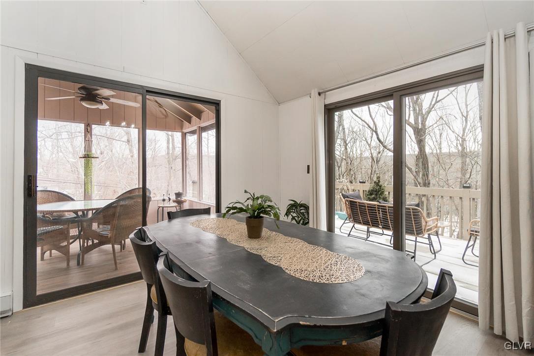 5967 Decker Road Bushkill, PA 18324 - Photo 15 of 47 a view of a dining room with furniture window and wooden floor
