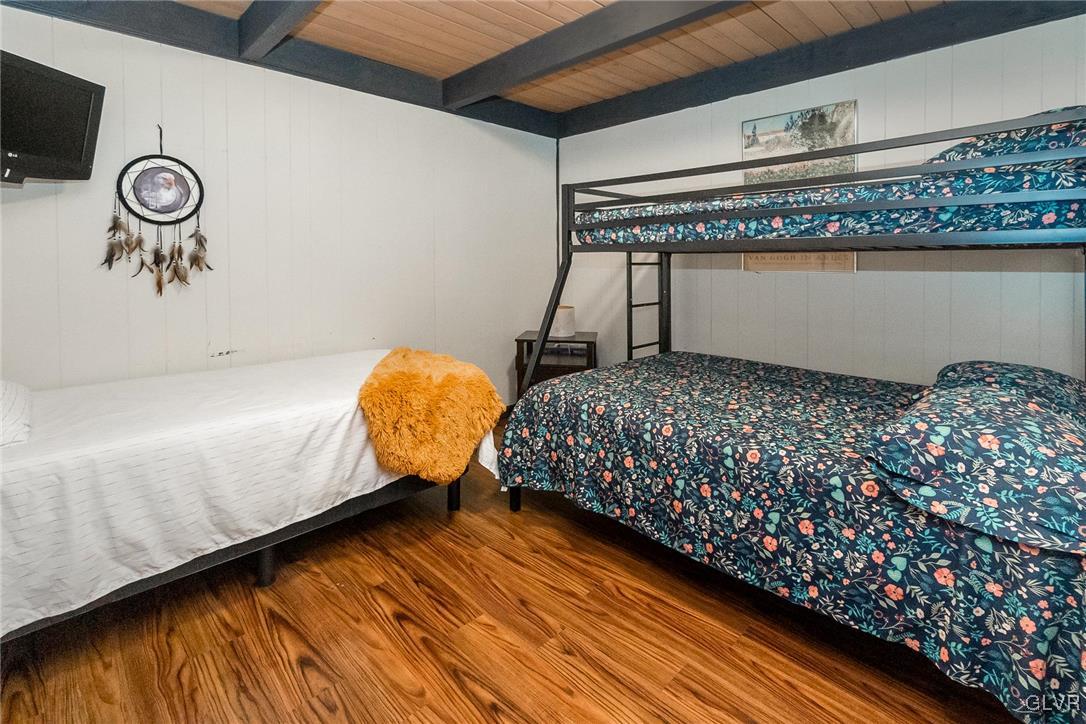 5967 Decker Road Bushkill, PA 18324 - Photo 28 of 47 a bedroom with a bed and window