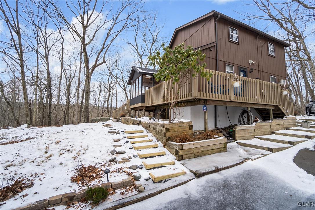 5967 Decker Road Bushkill, PA 18324 - Photo 3 of 47 a front view of a house with a yard