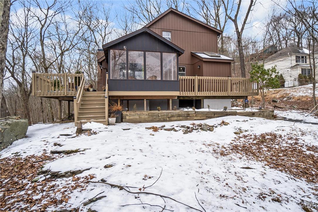 5967 Decker Road Bushkill, PA 18324 - Photo 4 of 47 a view of a house with a yard covered in snow