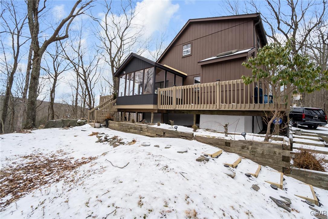 5967 Decker Road Bushkill, PA 18324 - Photo 6 of 47 a view of a house with a snow on the road