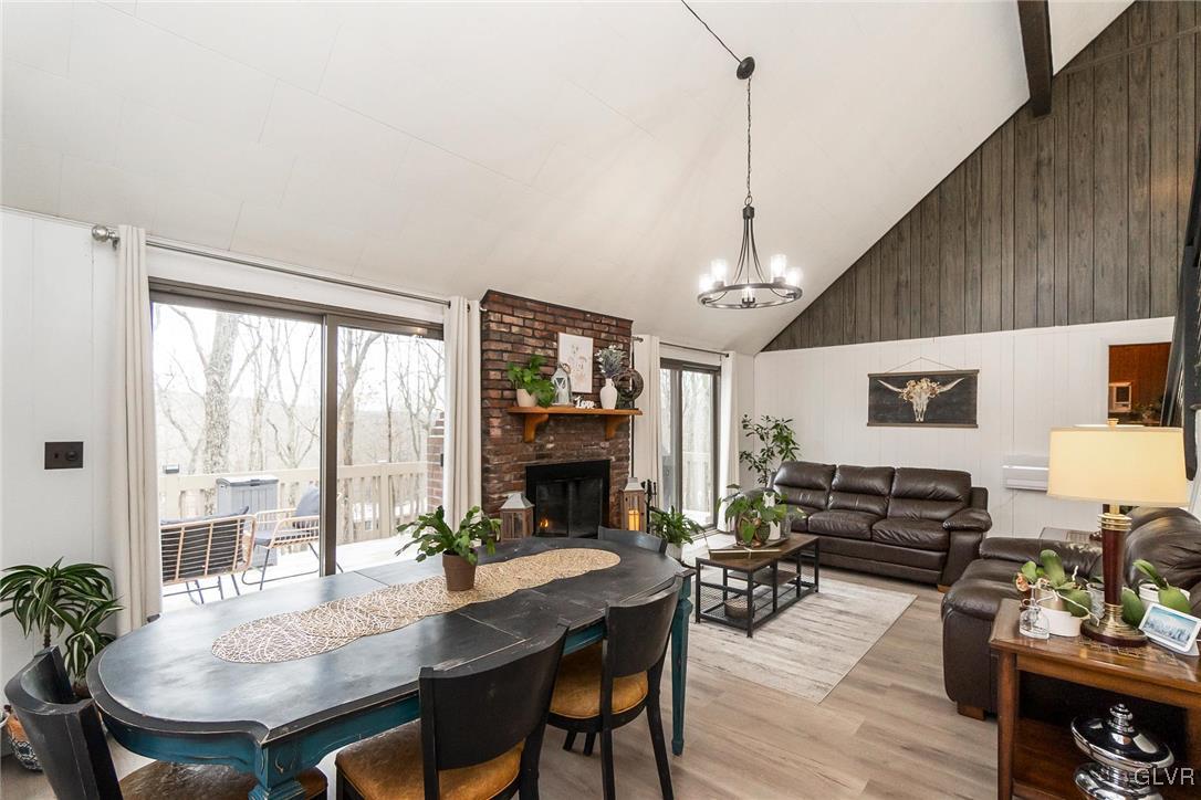 5967 Decker Road Bushkill, PA 18324 - Photo 8 of 47 a view of a livingroom with furniture window and wooden floor