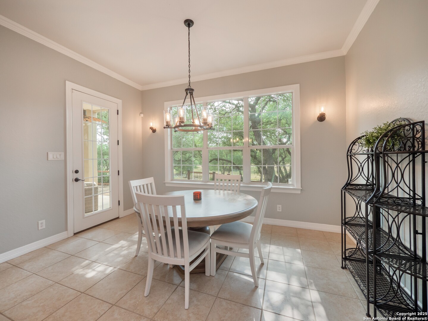 429 Fossil Hills Loop Spring Branch, TX 78070 - Photo 16 of 64 a view of a dining room with furniture window and outside view