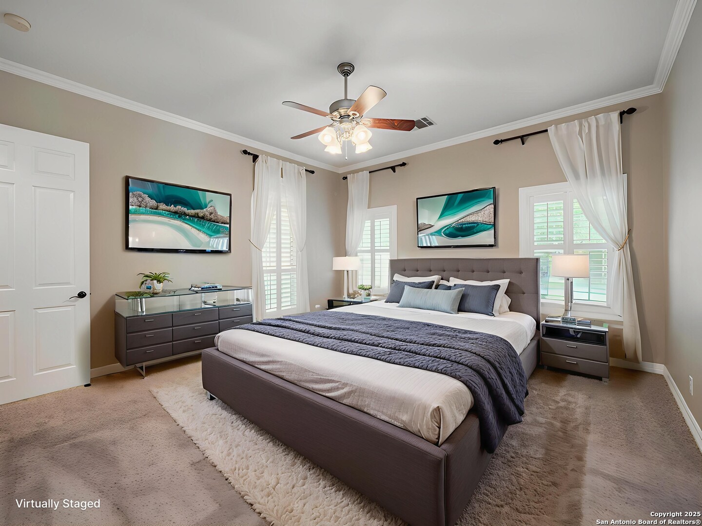 429 Fossil Hills Loop Spring Branch, TX 78070 - Photo 18 of 64 a spacious bedroom with a bed and a chandelier