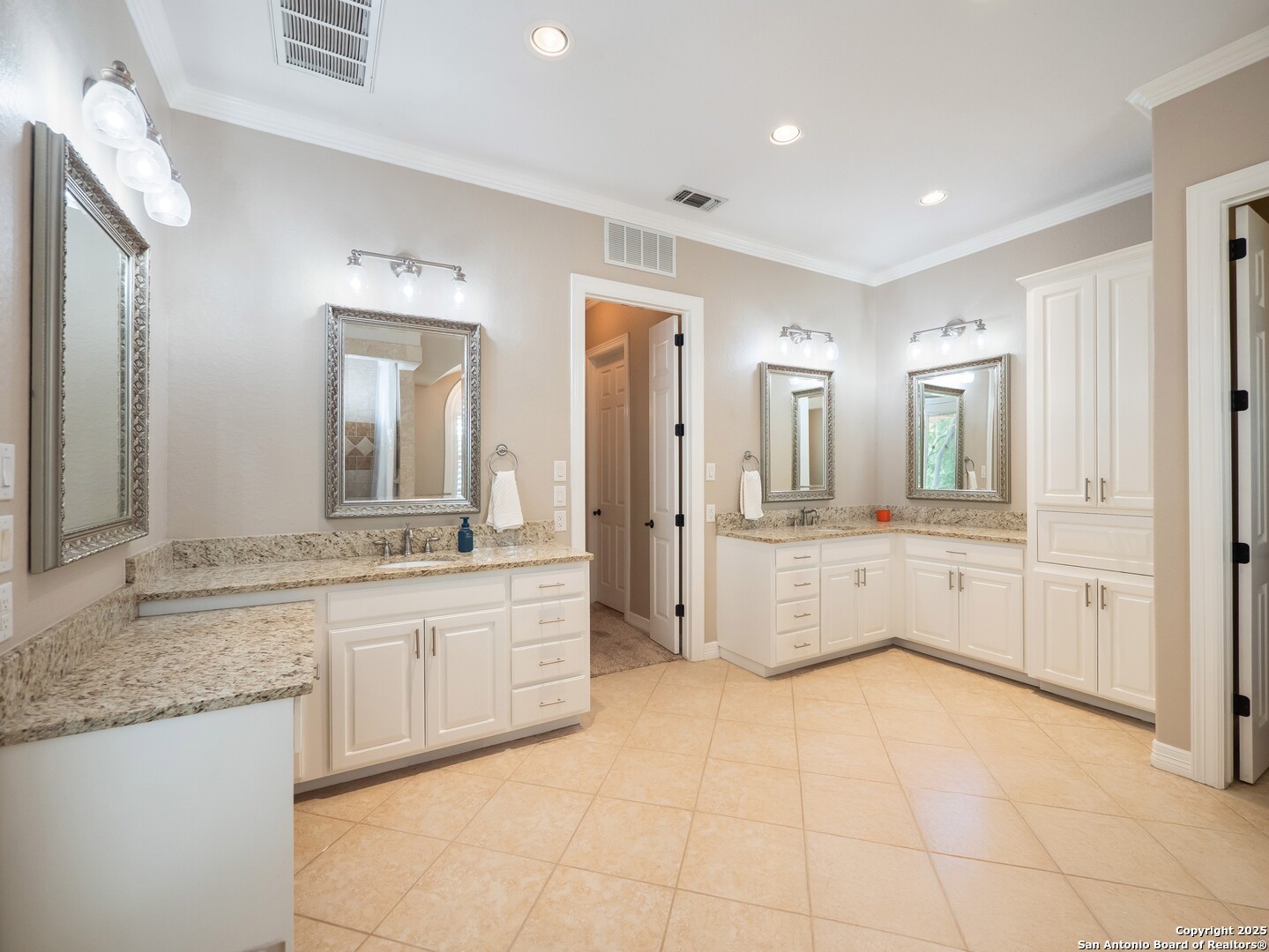 429 Fossil Hills Loop Spring Branch, TX 78070 - Photo 21 of 64 a large white bathroom with a granite countertop sink mirror and bathtub